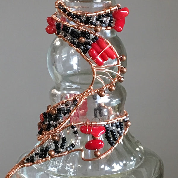 Coral in Woven Wire Decorative Bottle