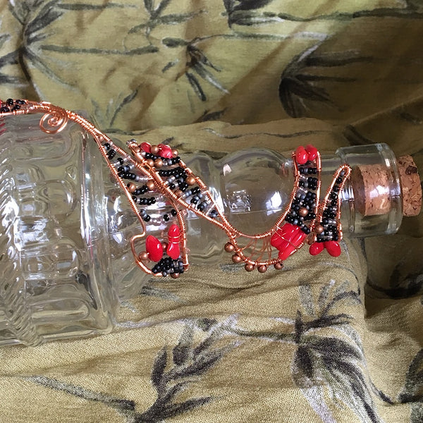 Coral in Woven Wire Decorative Bottle