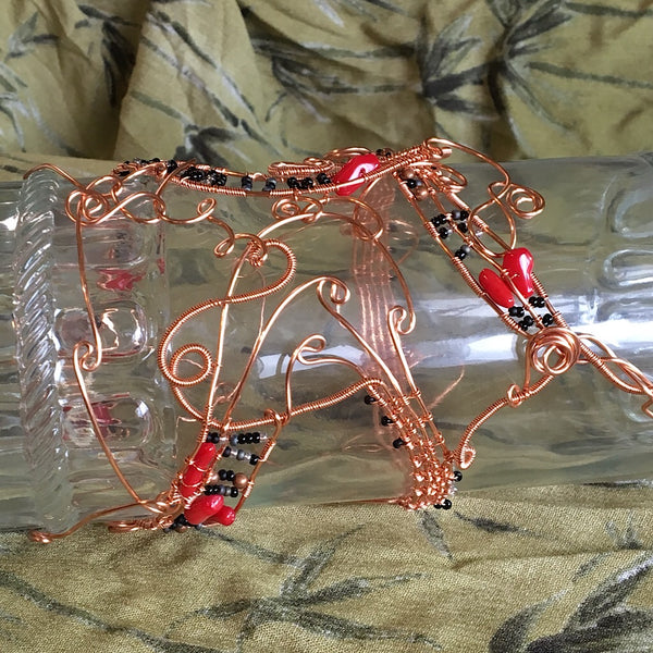 Coral in Woven Wire Decorative Bottle