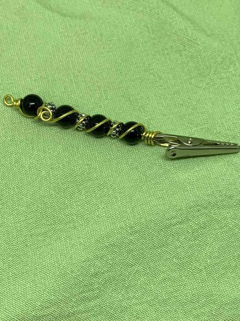 Swampy confetti bracelet helper (roach clip)